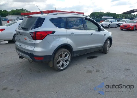 2019 Ford Escape Titanium из США, поврежденный, VIN 1FMCU9J98KUB98904